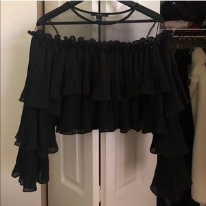 Black ruffled shirt